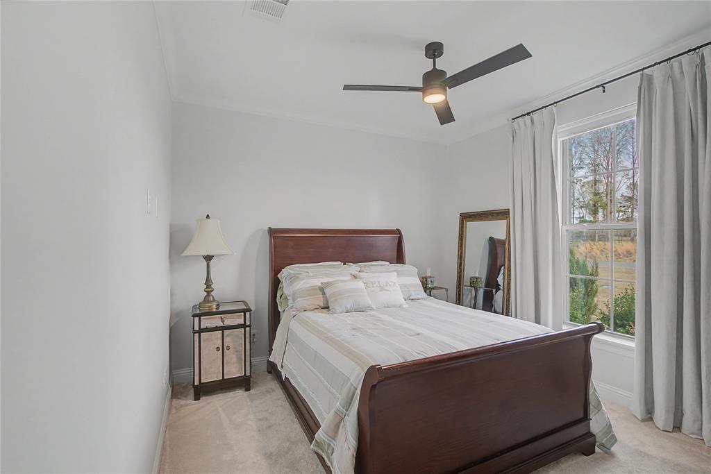 347 Ridge Drive Stonewall, LA 71078 - Photo 26 of 39 a bedroom with a bed and window
