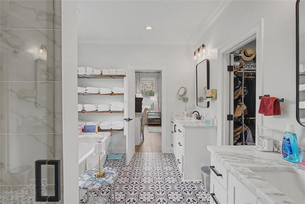 347 Ridge Drive Stonewall, LA 71078 - Photo 28 of 39 a bathroom with a sink toilet vanity and shower