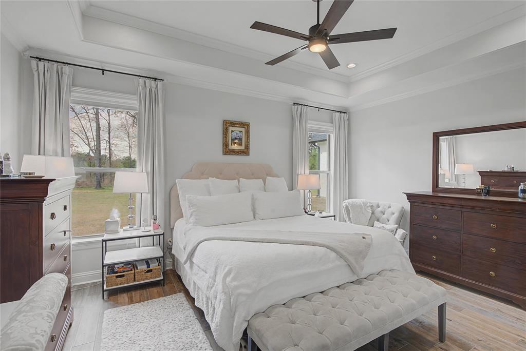 347 Ridge Drive Stonewall, LA 71078 - Photo 32 of 39 a bedroom with a bed and a dresser