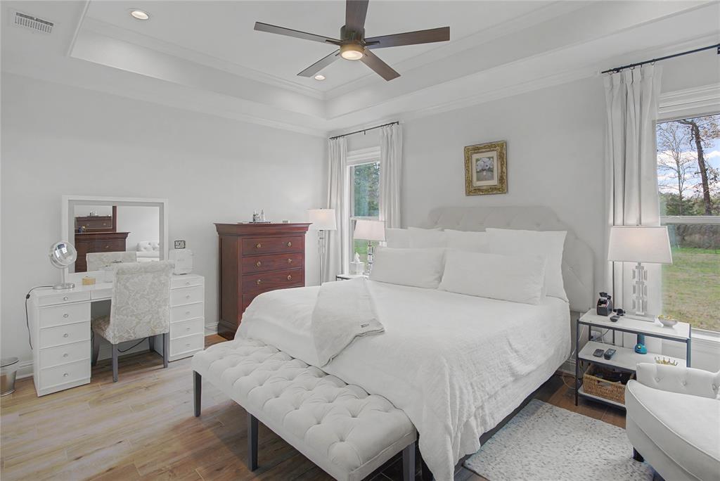 347 Ridge Drive Stonewall, LA 71078 - Photo 33 of 39 a bedroom with a bed and a table