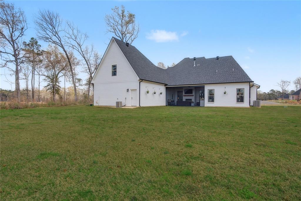 347 Ridge Drive Stonewall, LA 71078 - Photo 37 of 39 a house view with a garden space
