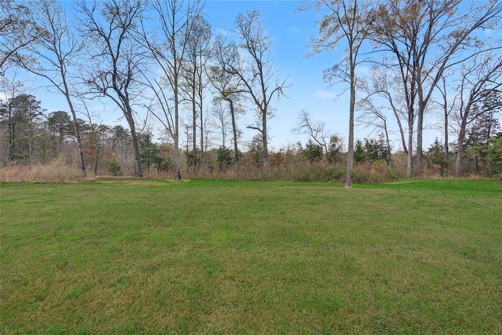 347 Ridge Drive Stonewall, LA 71078 - Photo 39 of 39 a backyard of a house with lots of green space