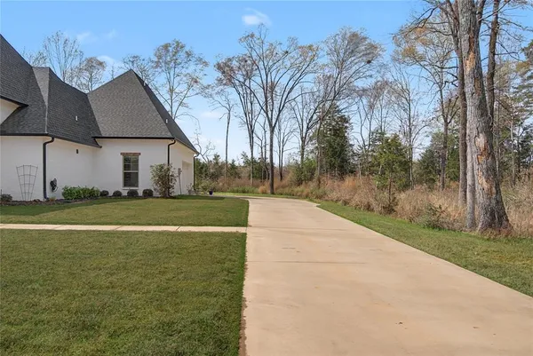 a view of a house with a big yard