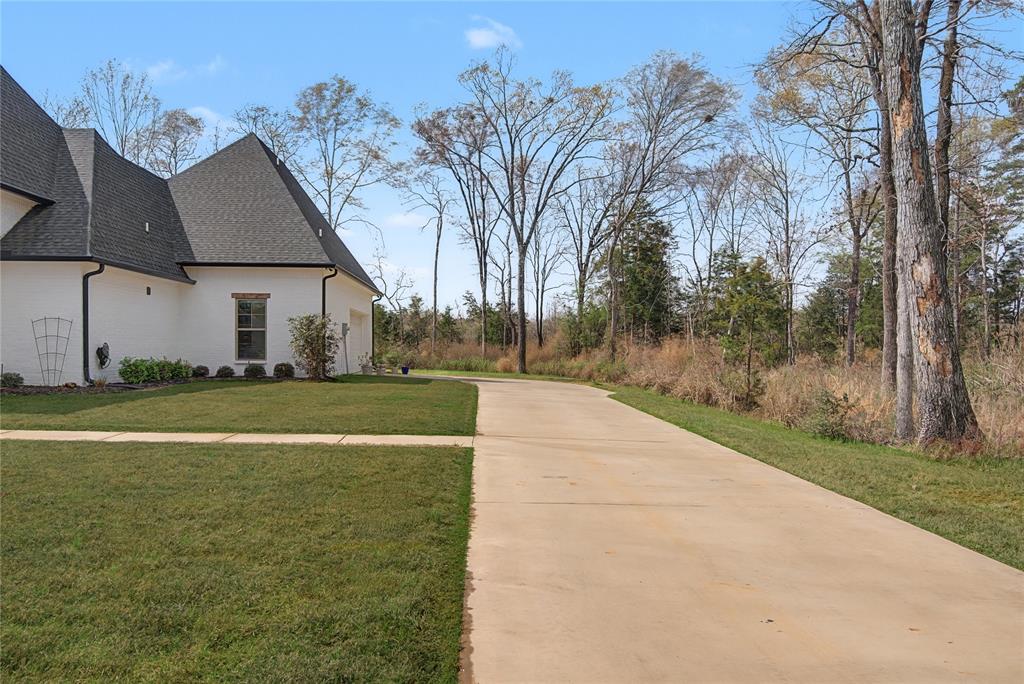347 Ridge Drive Stonewall, LA 71078 - Photo 4 of 39 a view of a house with a big yard