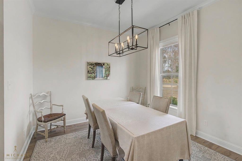 347 Ridge Drive Stonewall, LA 71078 - Photo 10 of 39 a view of a dining room with a table and chairs