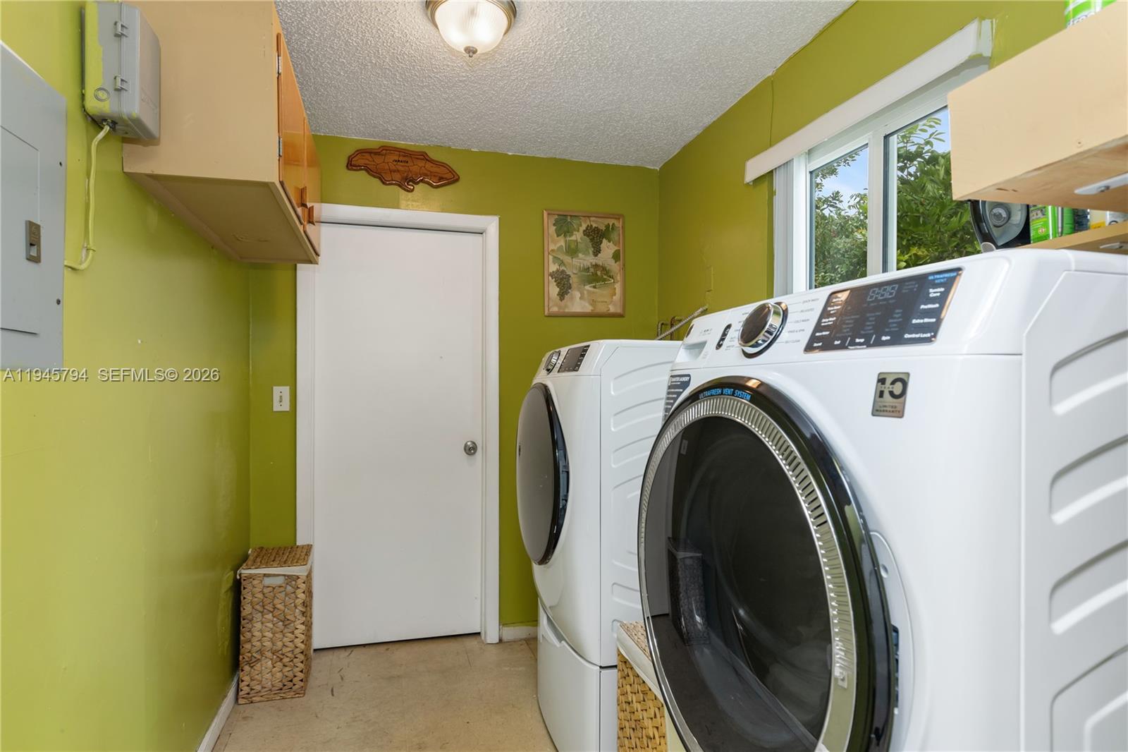 15244 Southwest 108th Court Miami, FL 33157 - Photo 11 of 47 a utility room with dryer and washer