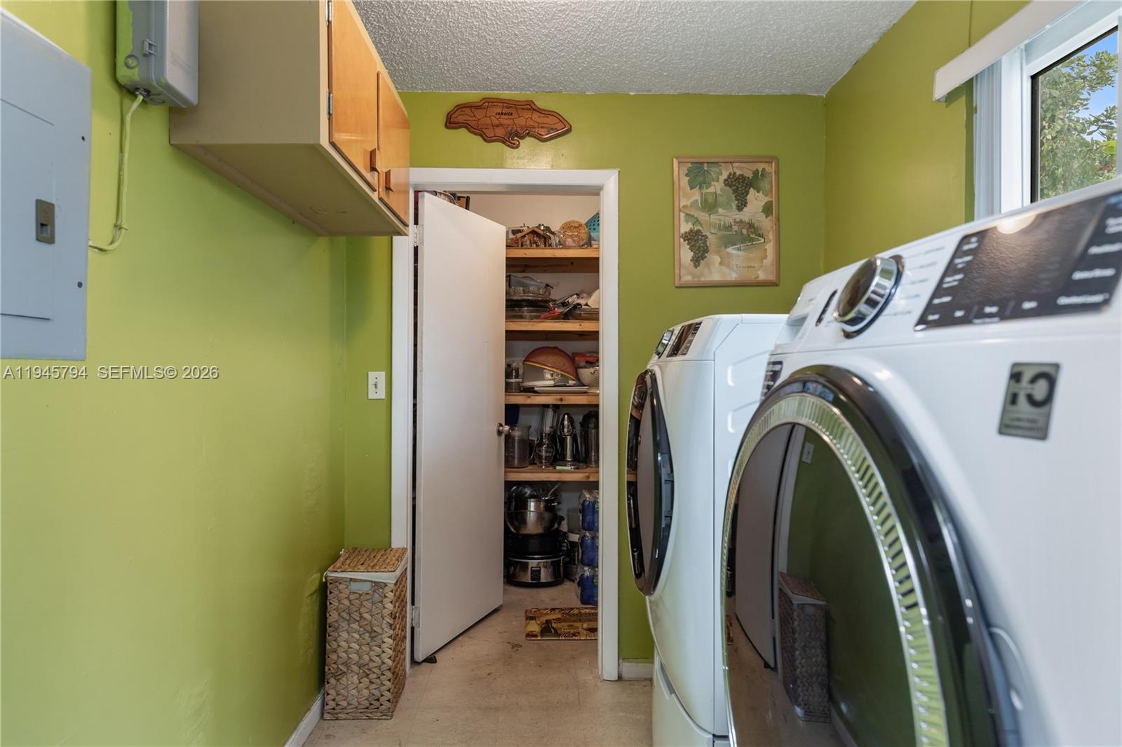 15244 Southwest 108th Court Miami, FL 33157 - Photo 12 of 47 a utility room with dryer and washer