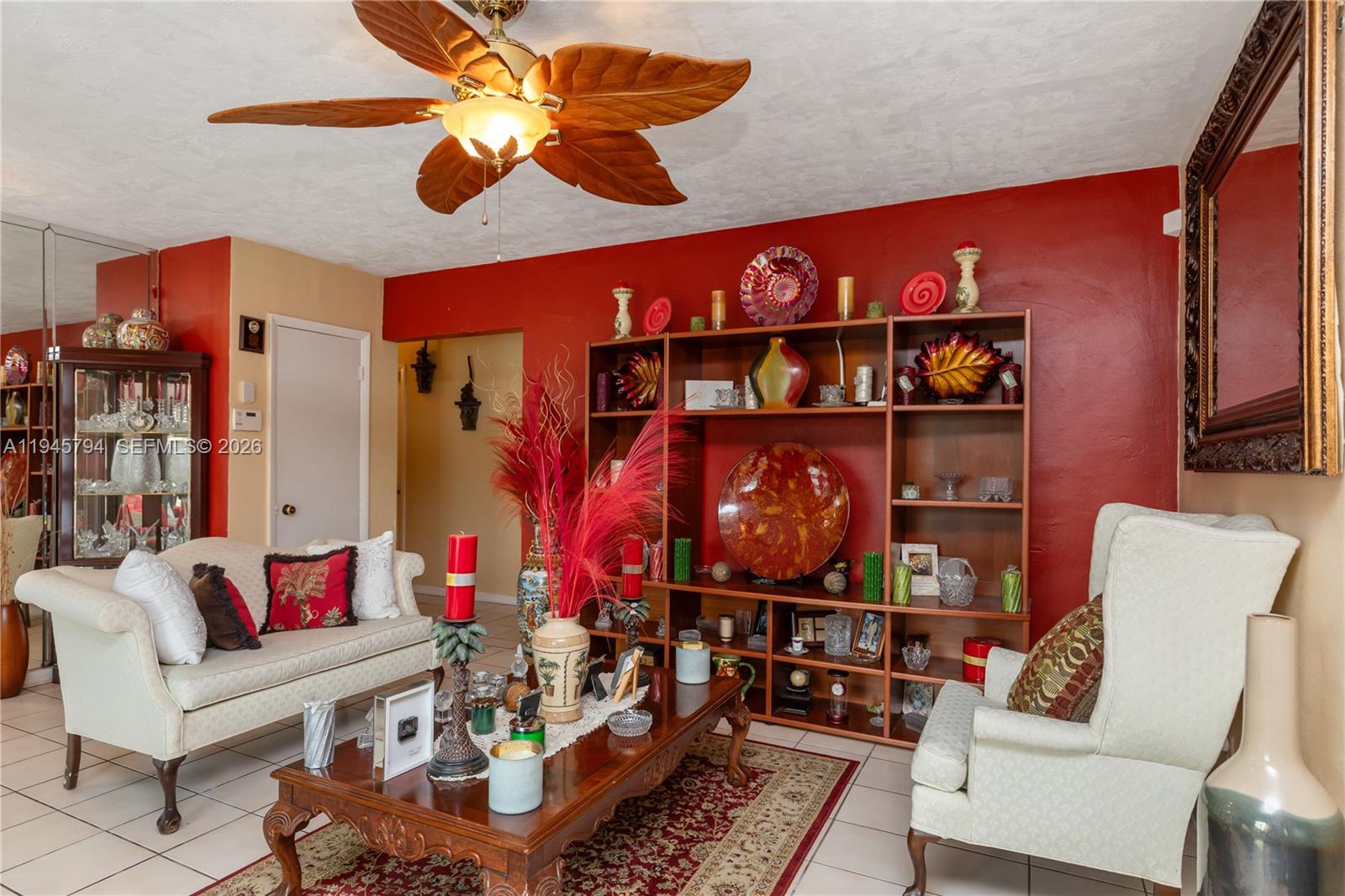 15244 Southwest 108th Court Miami, FL 33157 - Photo 17 of 47 a living room with furniture a rug and a fireplace