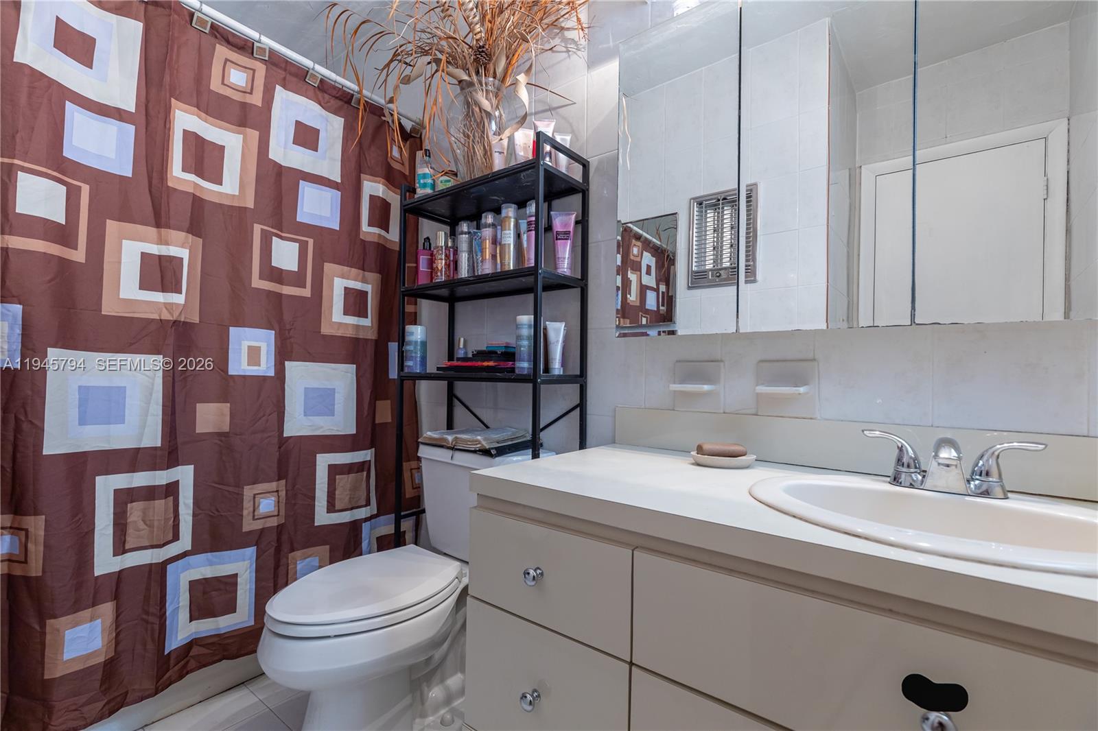 15244 Southwest 108th Court Miami, FL 33157 - Photo 20 of 47 a bathroom with a sink toilet and a shower