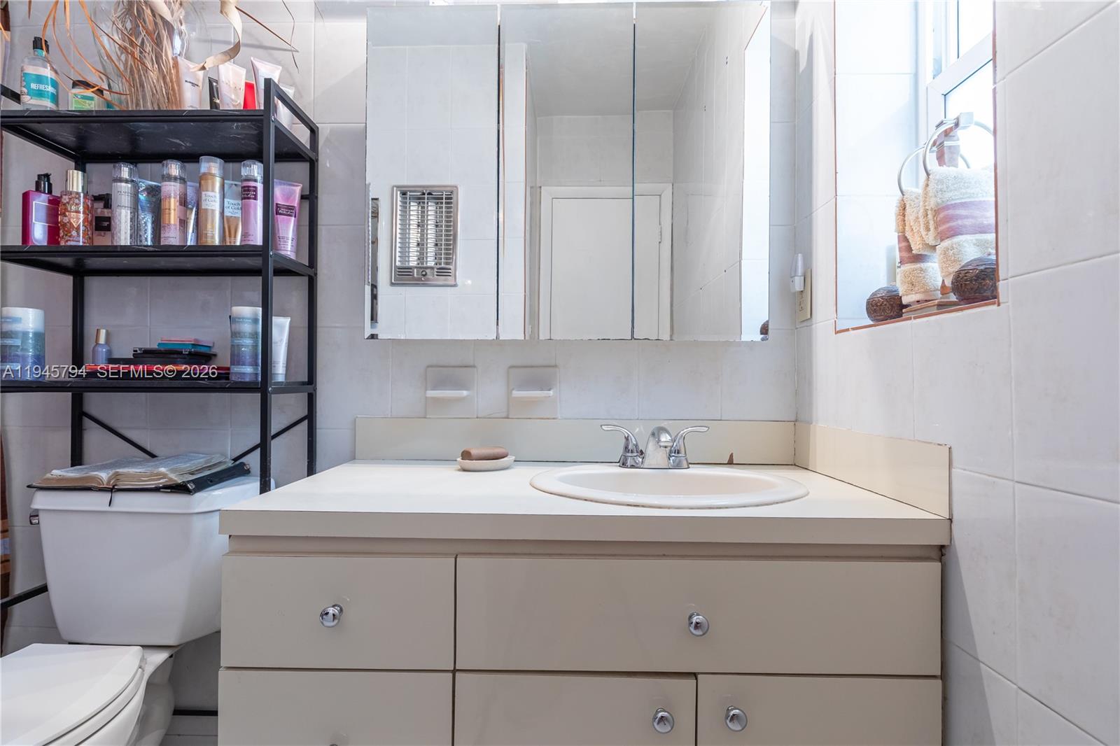 15244 Southwest 108th Court Miami, FL 33157 - Photo 21 of 47 a bathroom with a sink and a toilet