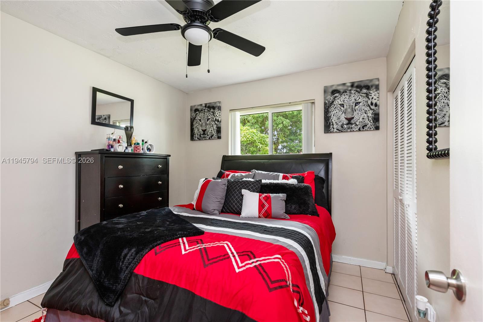 15244 Southwest 108th Court Miami, FL 33157 - Photo 29 of 47 a bedroom with a bed and a dresser