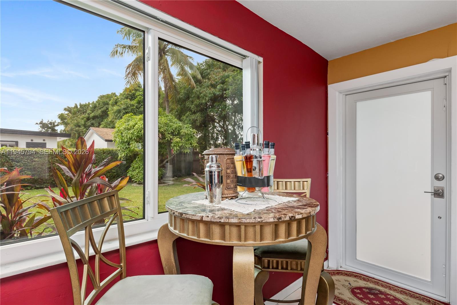 15244 Southwest 108th Court Miami, FL 33157 - Photo 36 of 47 a view of a dining room with furniture window and wooden floor