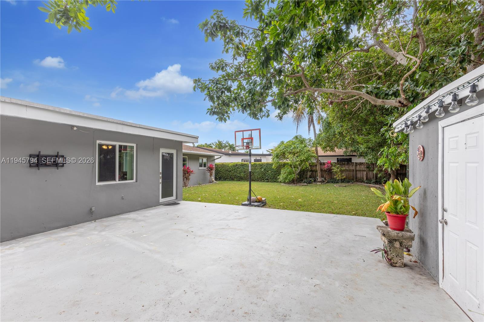 15244 Southwest 108th Court Miami, FL 33157 - Photo 38 of 47 a view of a house with a back yard