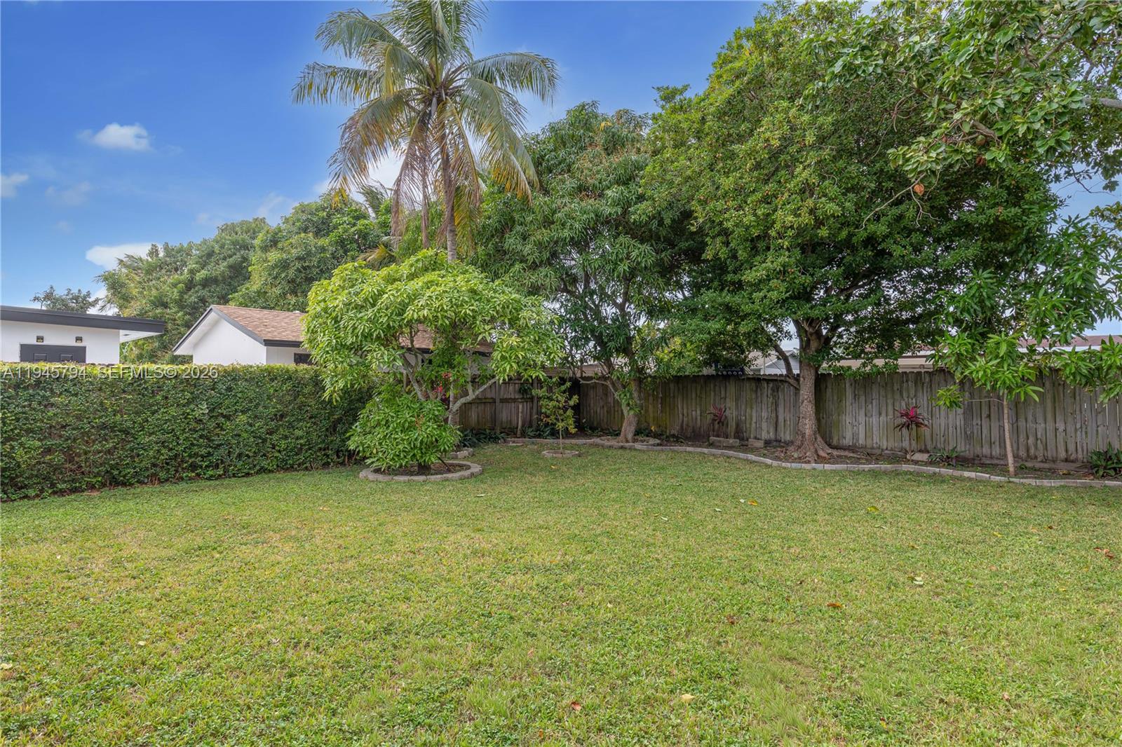 15244 Southwest 108th Court Miami, FL 33157 - Photo 43 of 47 a backyard of a house