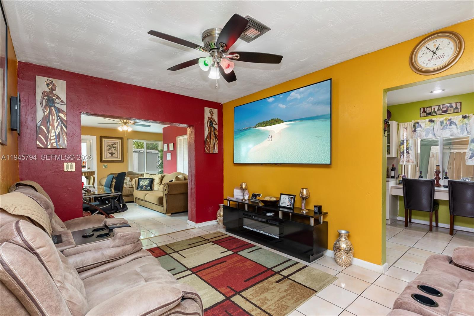 15244 Southwest 108th Court Miami, FL 33157 - Photo 7 of 47 a living room with furniture and a flat screen tv