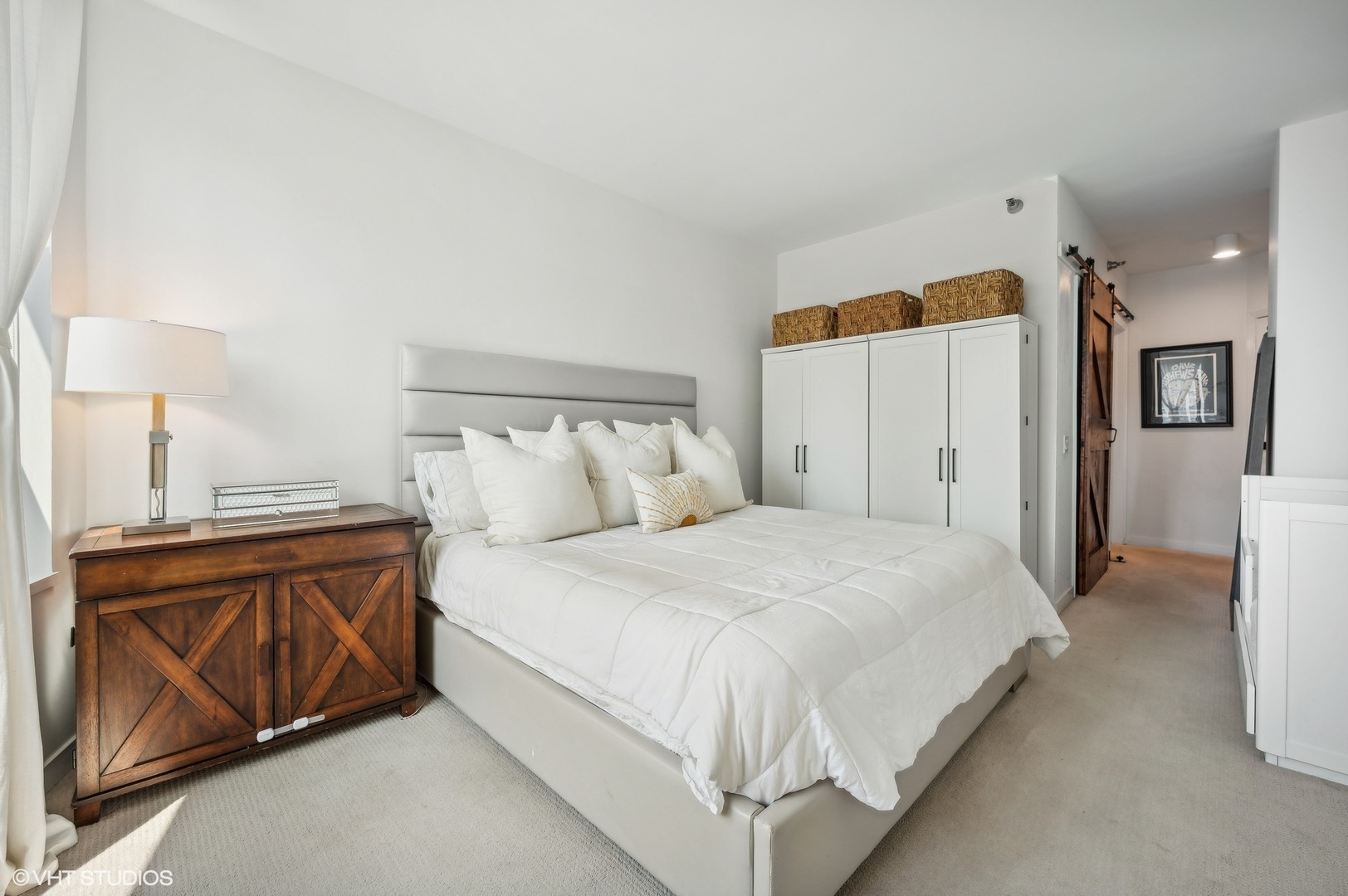 501 North Clinton Street, Unit 604 Chicago, IL 60654 - Photo 13 of 25 a bedroom with bed and window