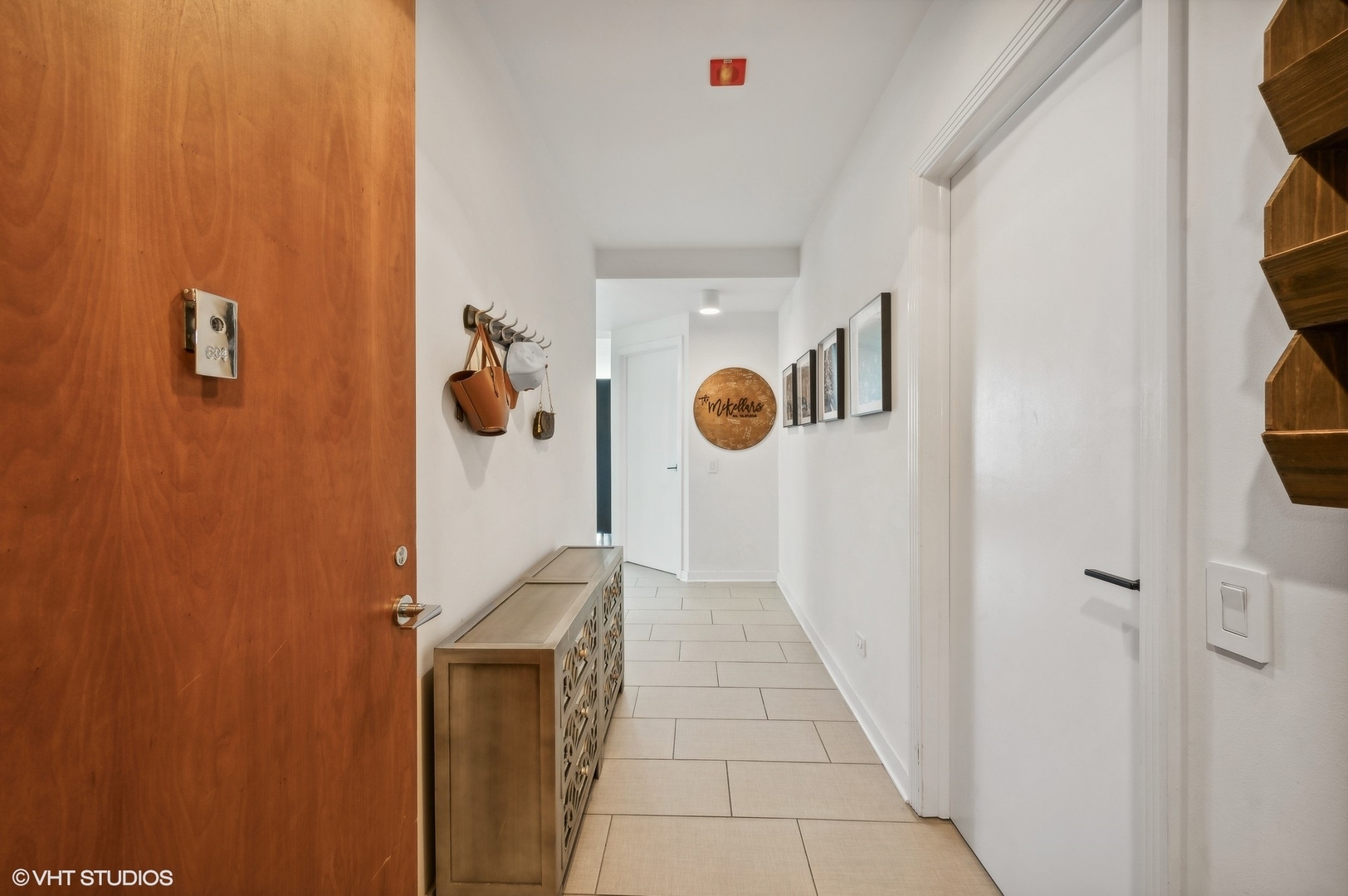 501 North Clinton Street, Unit 604 Chicago, IL 60654 - Photo 3 of 25 a view of a hallway with shower and door