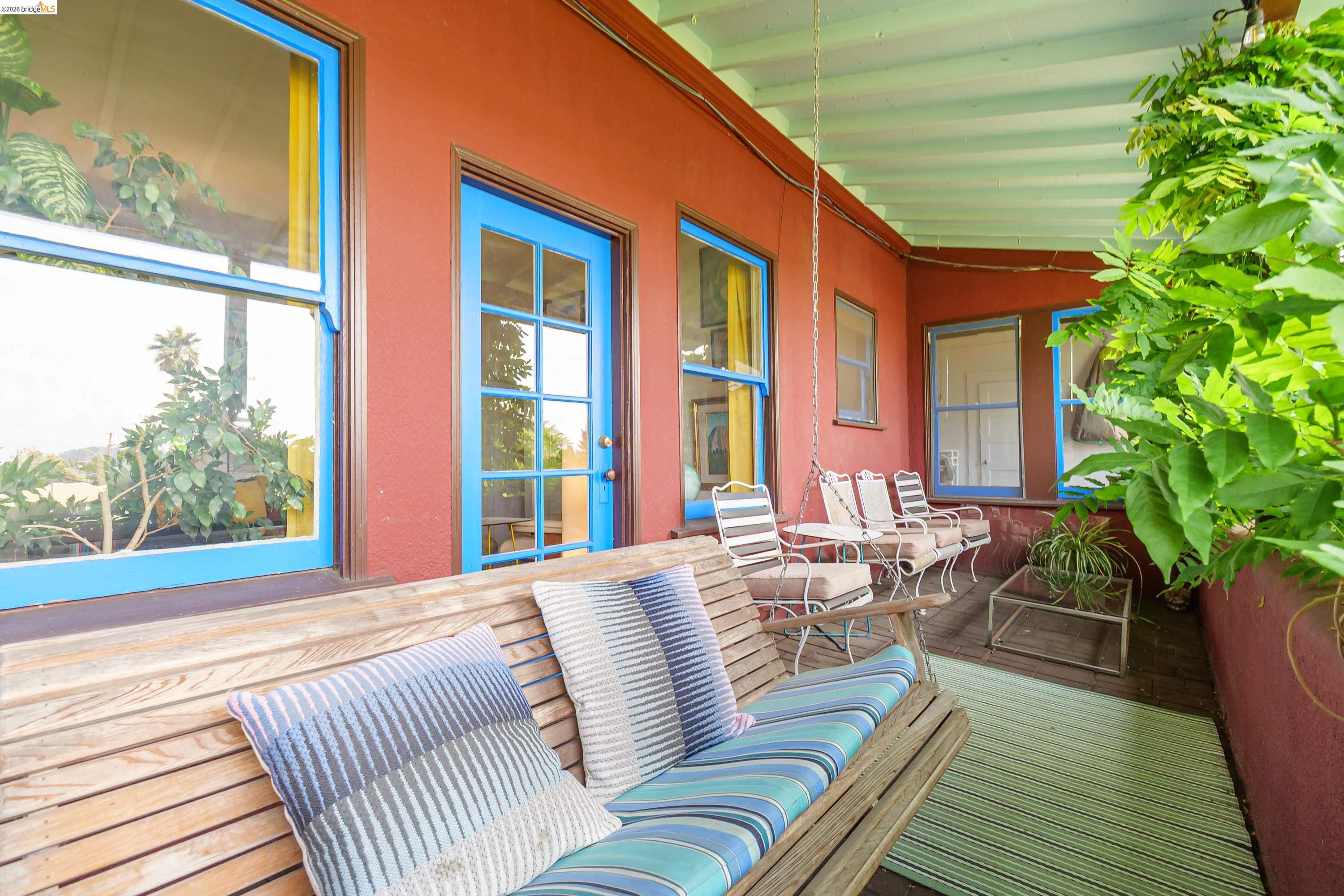 1735 Tenth Street Berkeley, CA 94710 - Photo 2 of 50 a balcony with furniture and a potted plant