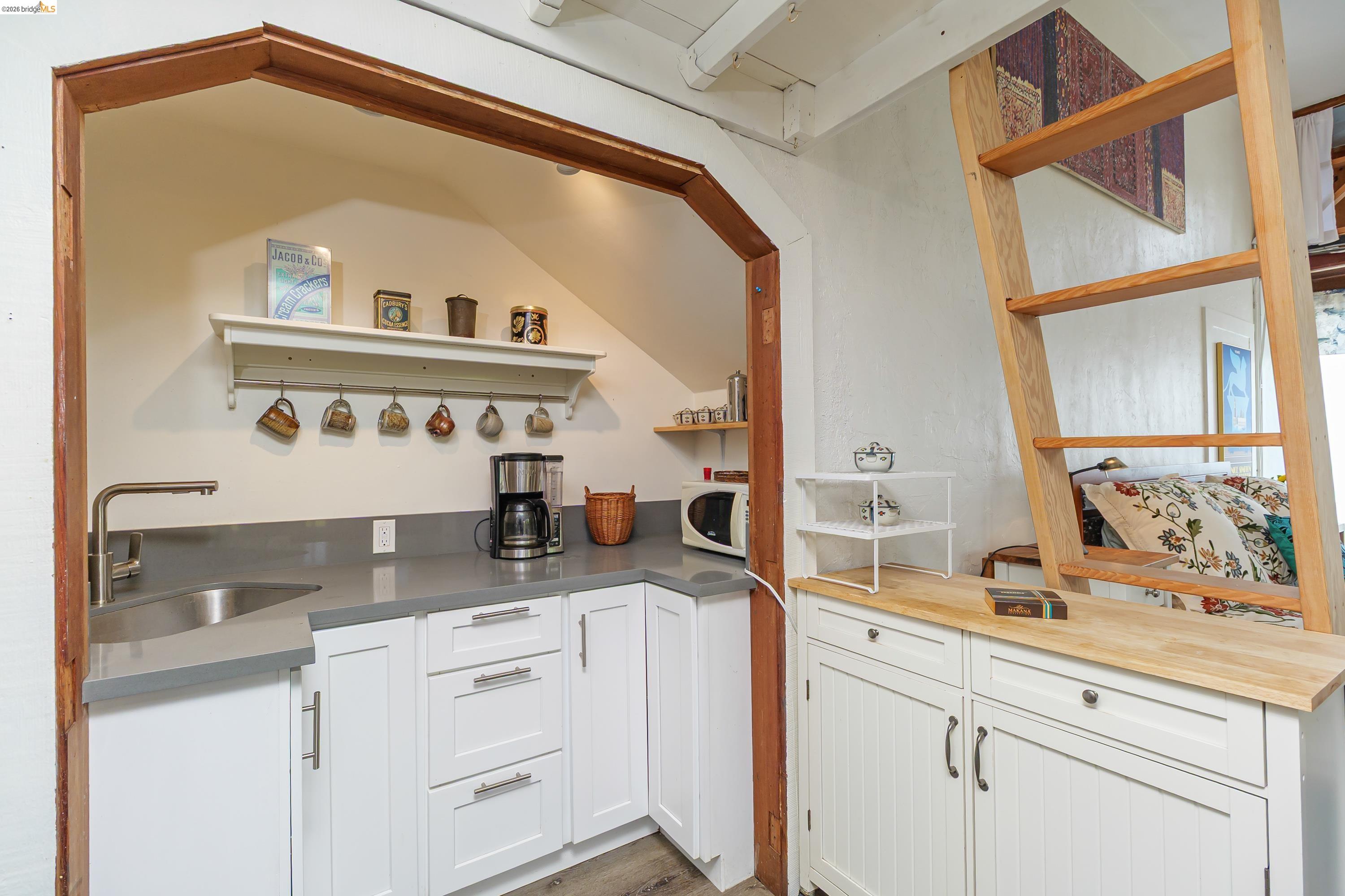 1735 Tenth Street Berkeley, CA 94710 - Photo 25 of 50 a kitchen with sink and mirror
