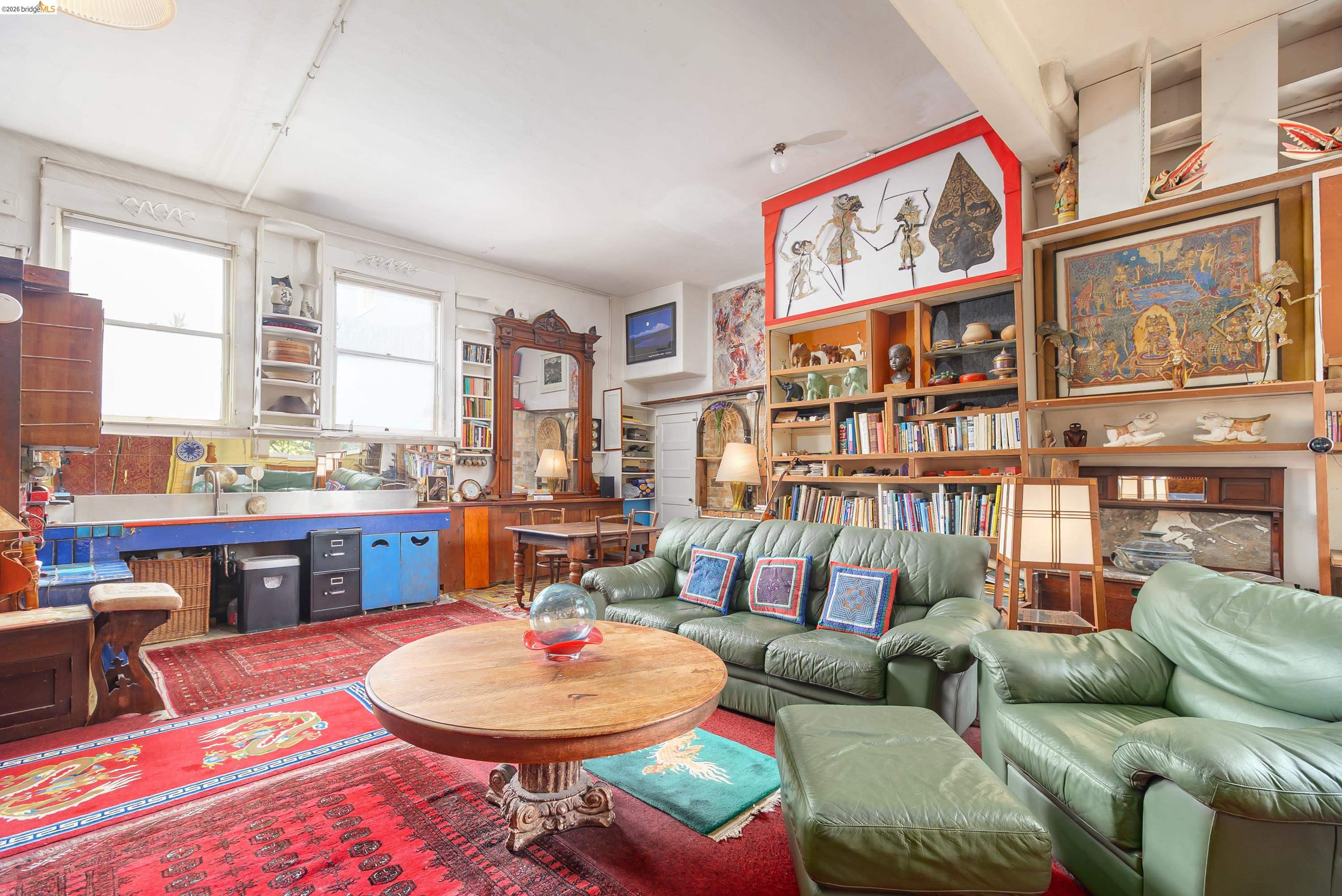 1735 Tenth Street Berkeley, CA 94710 - Photo 26 of 50 a living room with furniture and a large window