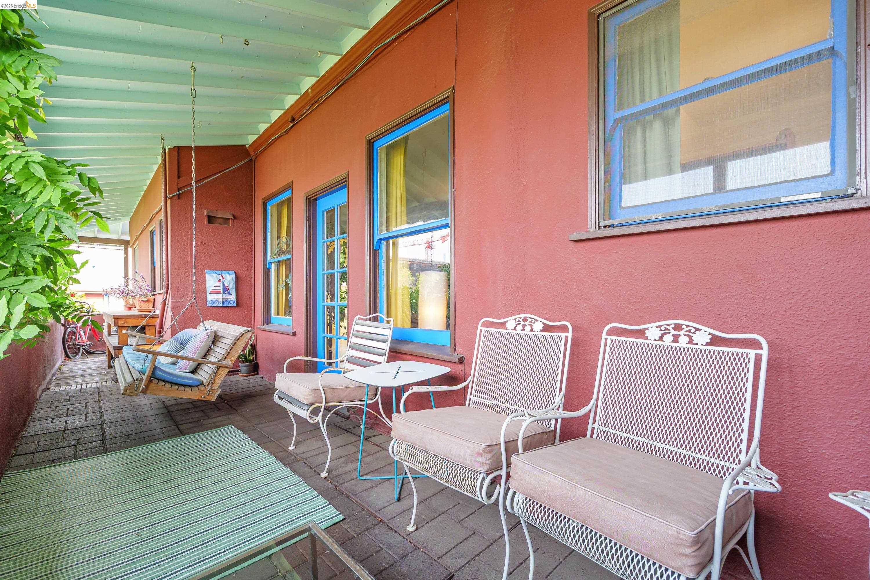 1735 Tenth Street Berkeley, CA 94710 - Photo 3 of 50 a couple of chairs sitting in front of a house