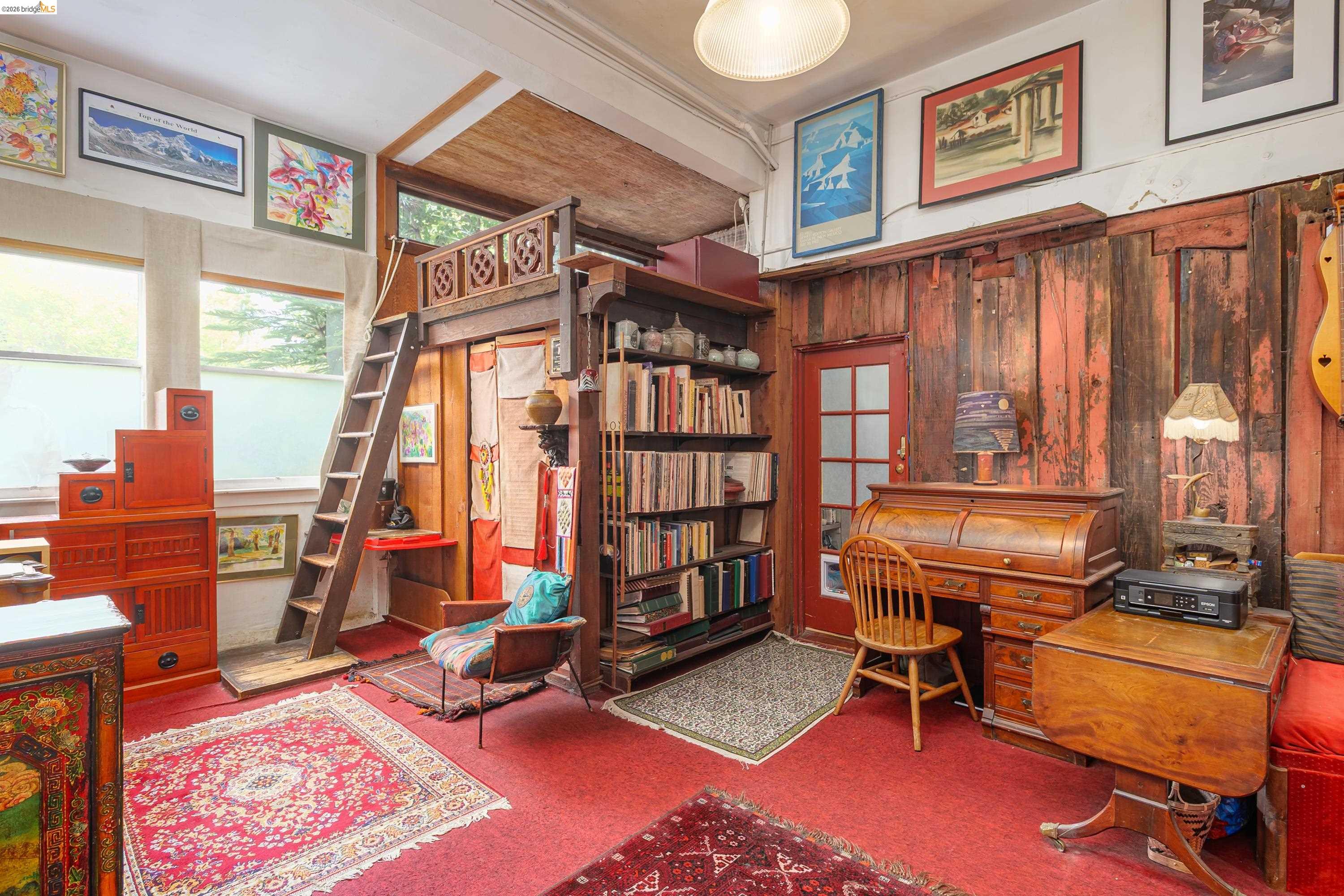1735 Tenth Street Berkeley, CA 94710 - Photo 31 of 50 a living room with furniture a piano and a bookshelf