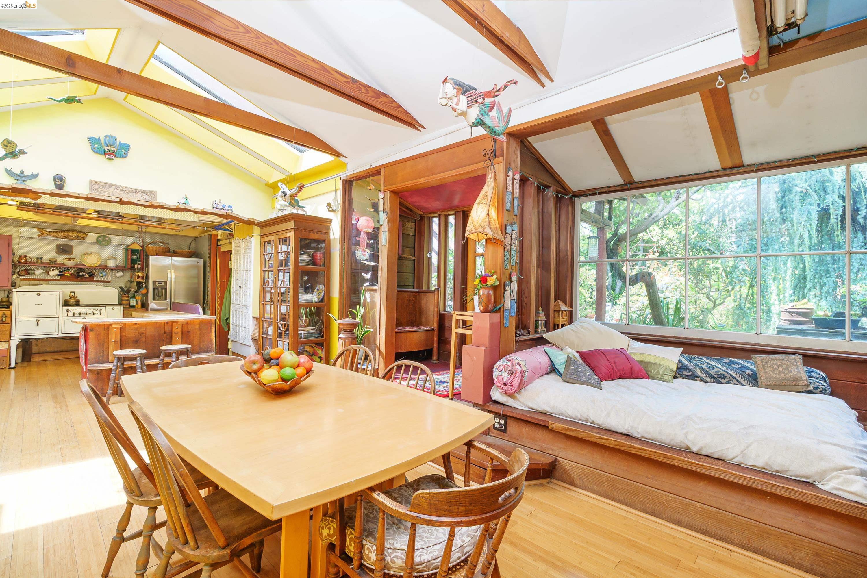 1735 Tenth Street Berkeley, CA 94710 - Photo 35 of 50 a dining room with furniture and large windows