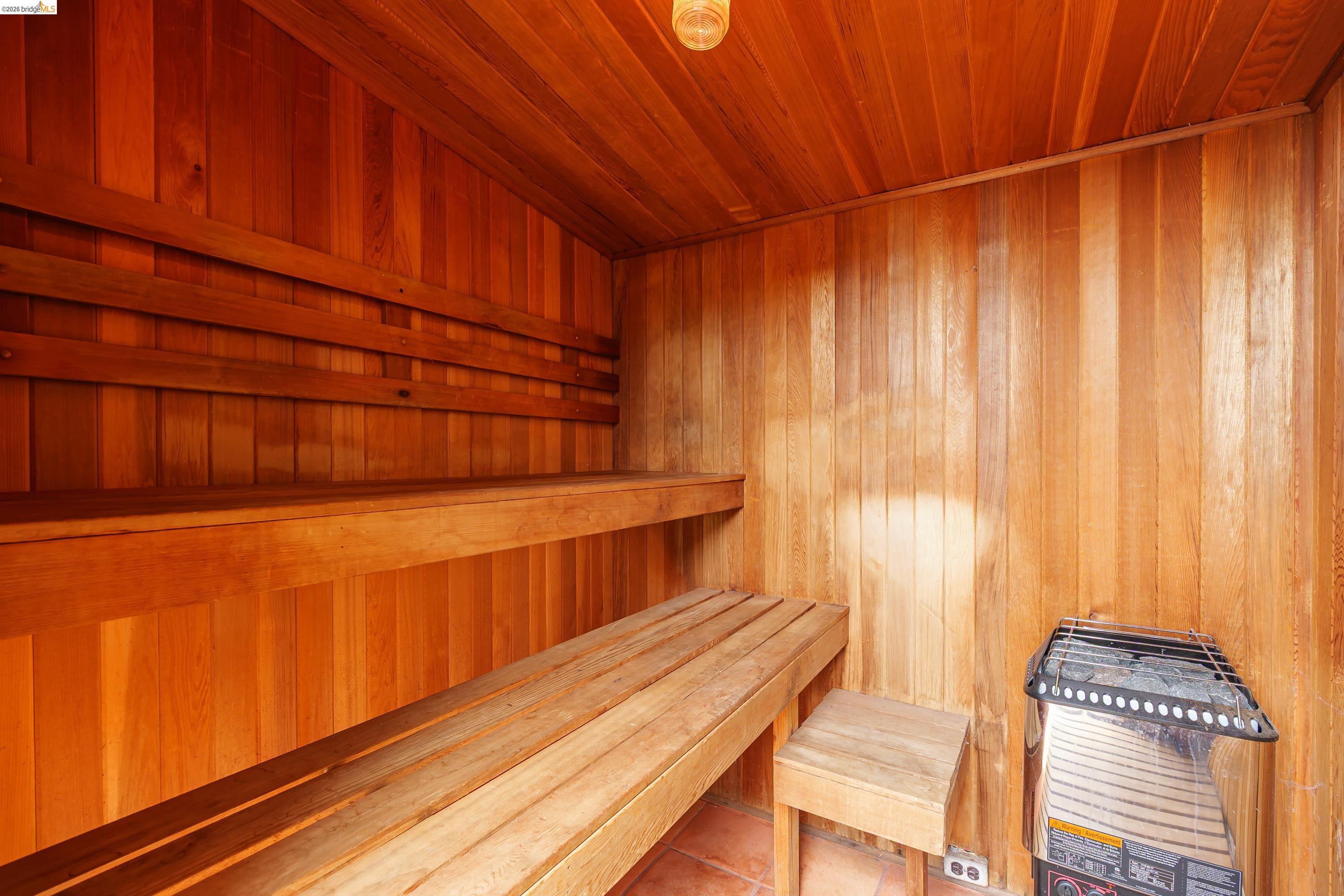 1735 Tenth Street Berkeley, CA 94710 - Photo 47 of 50 a view of a room with wooden floor and chair