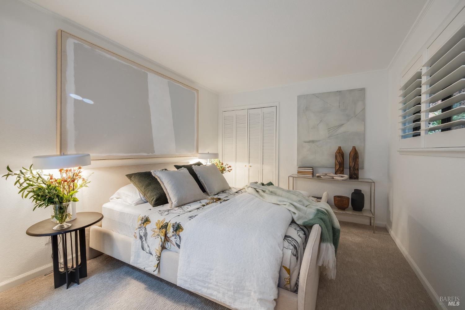 108 Stanford Way Sausalito, CA 94965 - Photo 21 of 43 a bedroom with bed and a potted plant