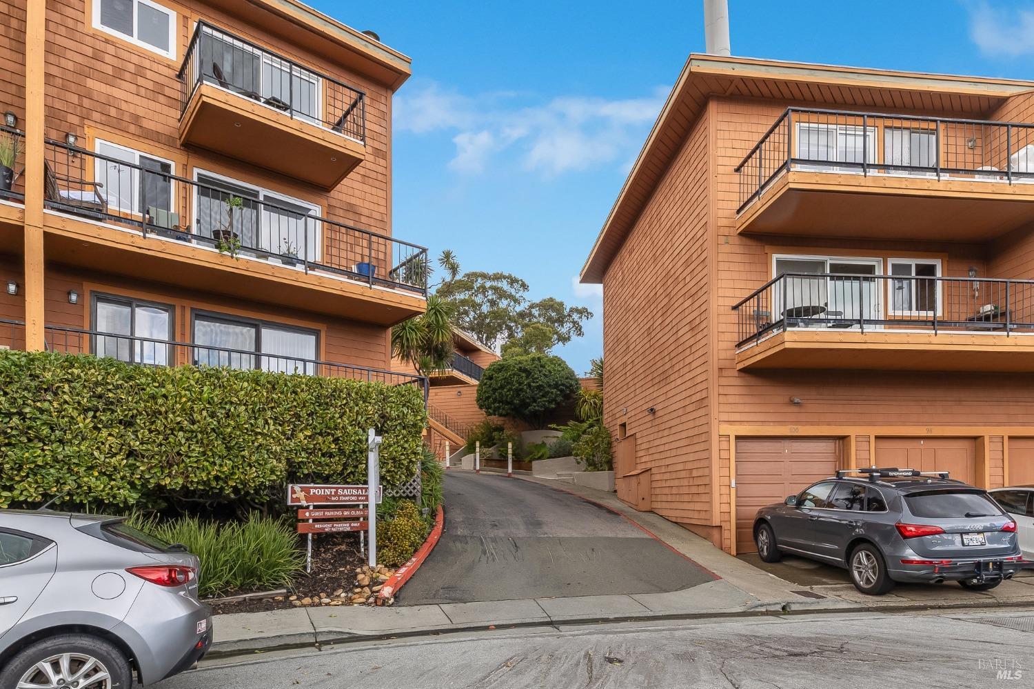 108 Stanford Way Sausalito, CA 94965 - Photo 42 of 43 a front view of a house with parking
