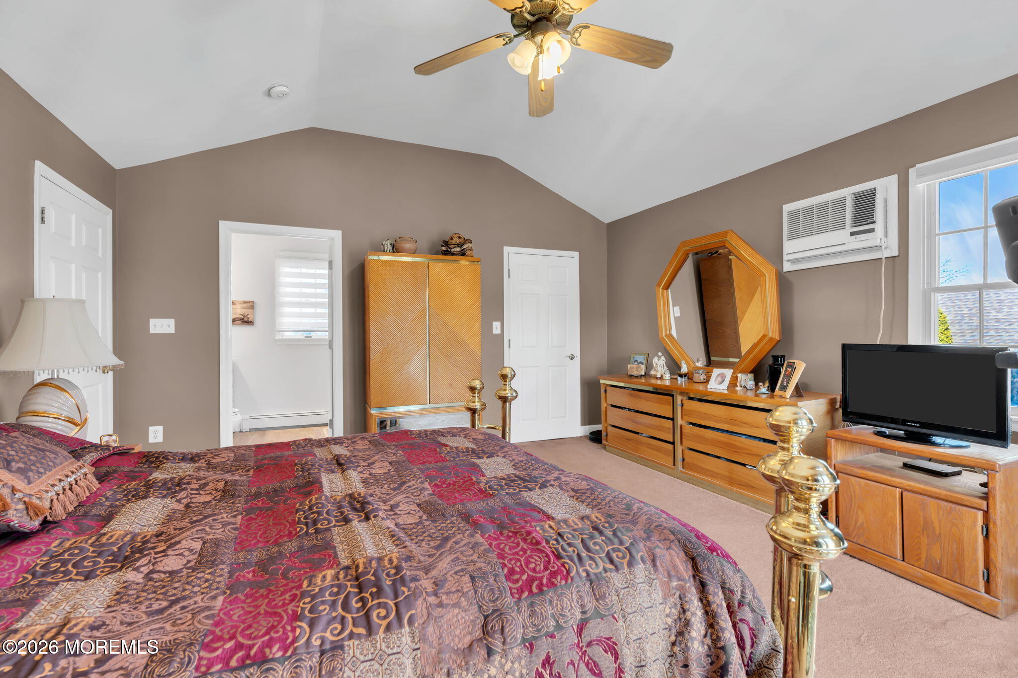 83 Seawood Drive Keyport, NJ 07735 - Photo 15 of 23 a bedroom with a bed and a flat screen tv