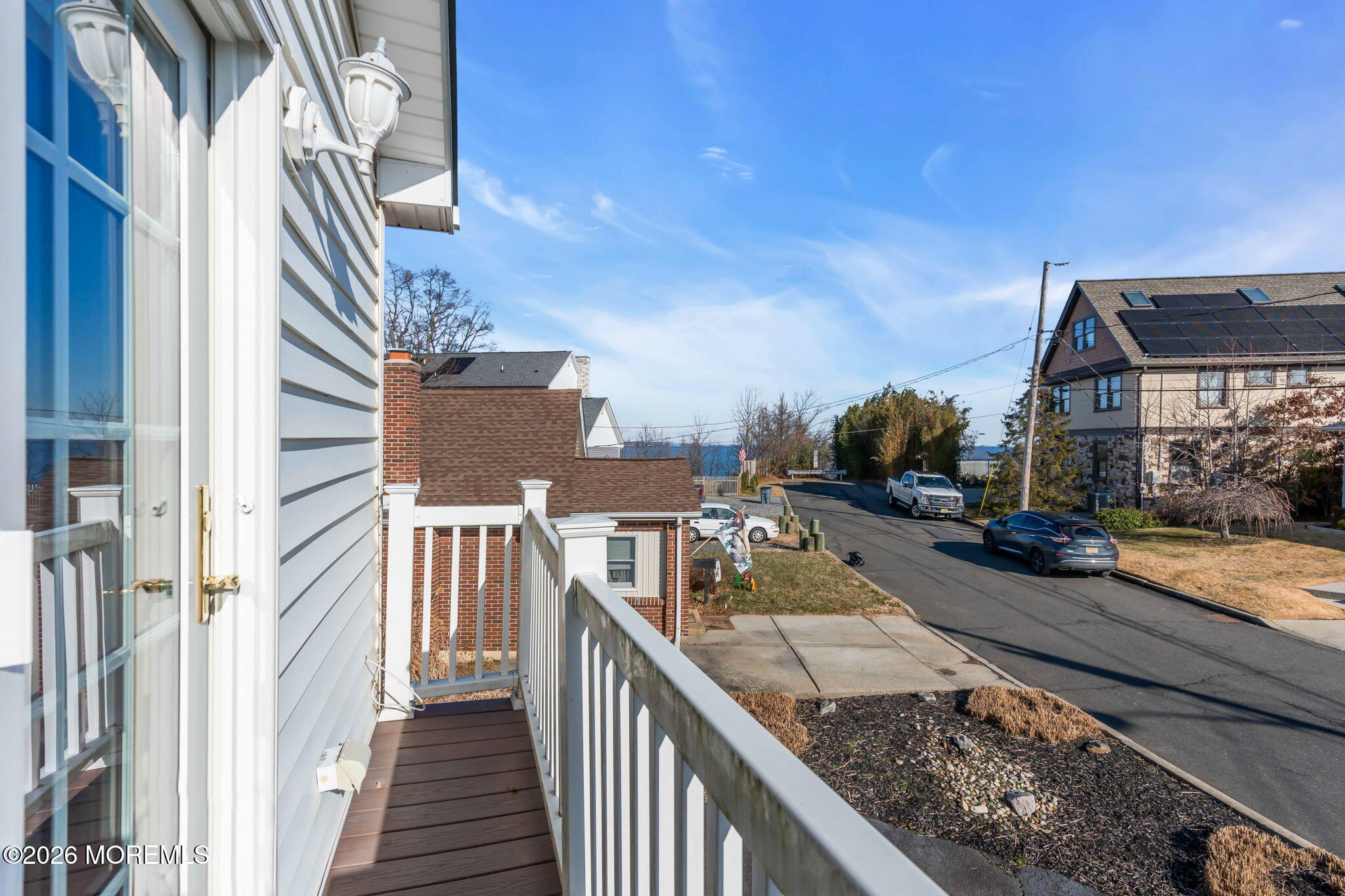 83 Seawood Drive Keyport, NJ 07735 - Photo 16 of 23 a city view with buildings and cars parked in front of it