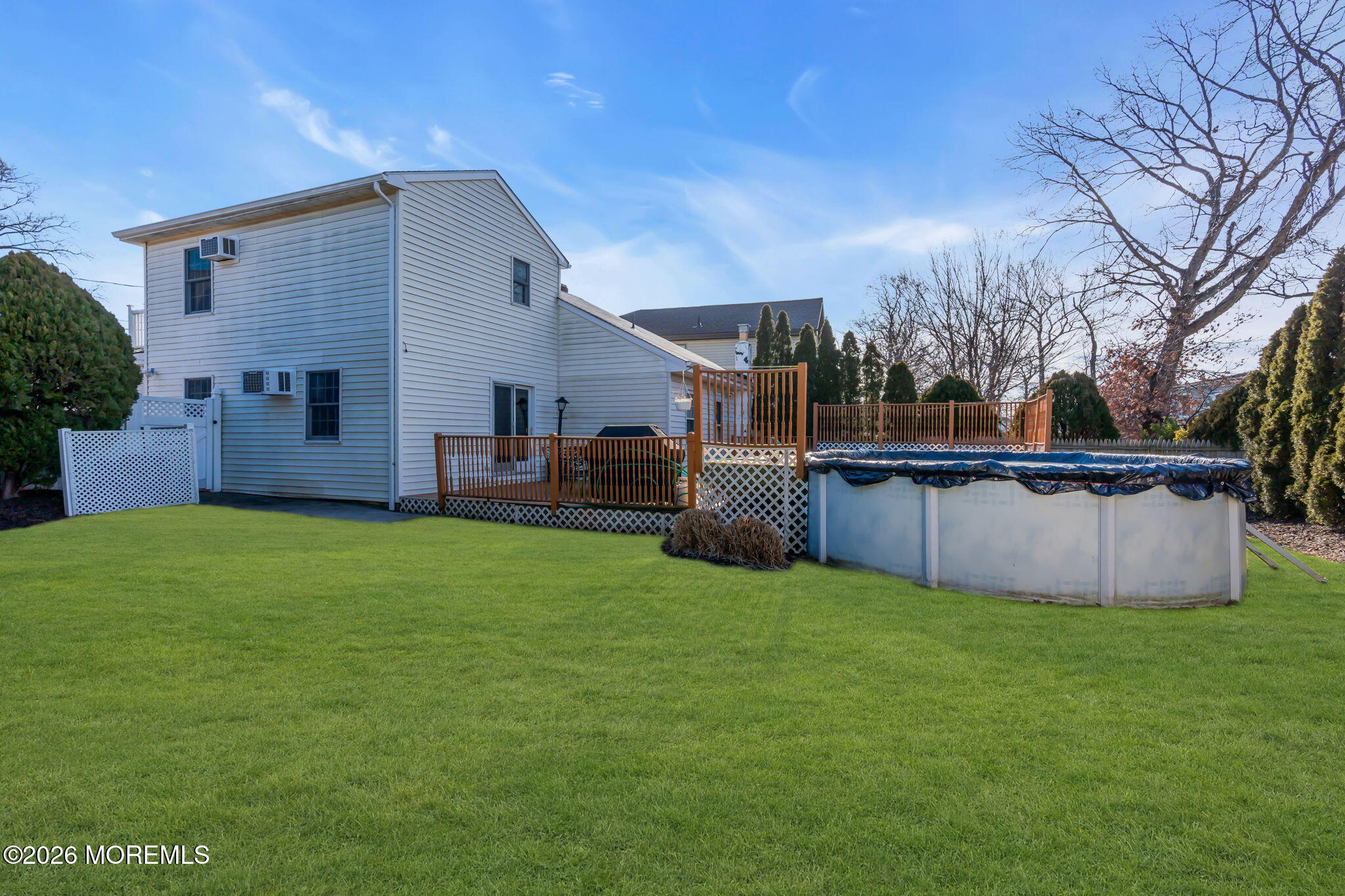 83 Seawood Drive Keyport, NJ 07735 - Photo 18 of 23 a view of a house with backyard and garden