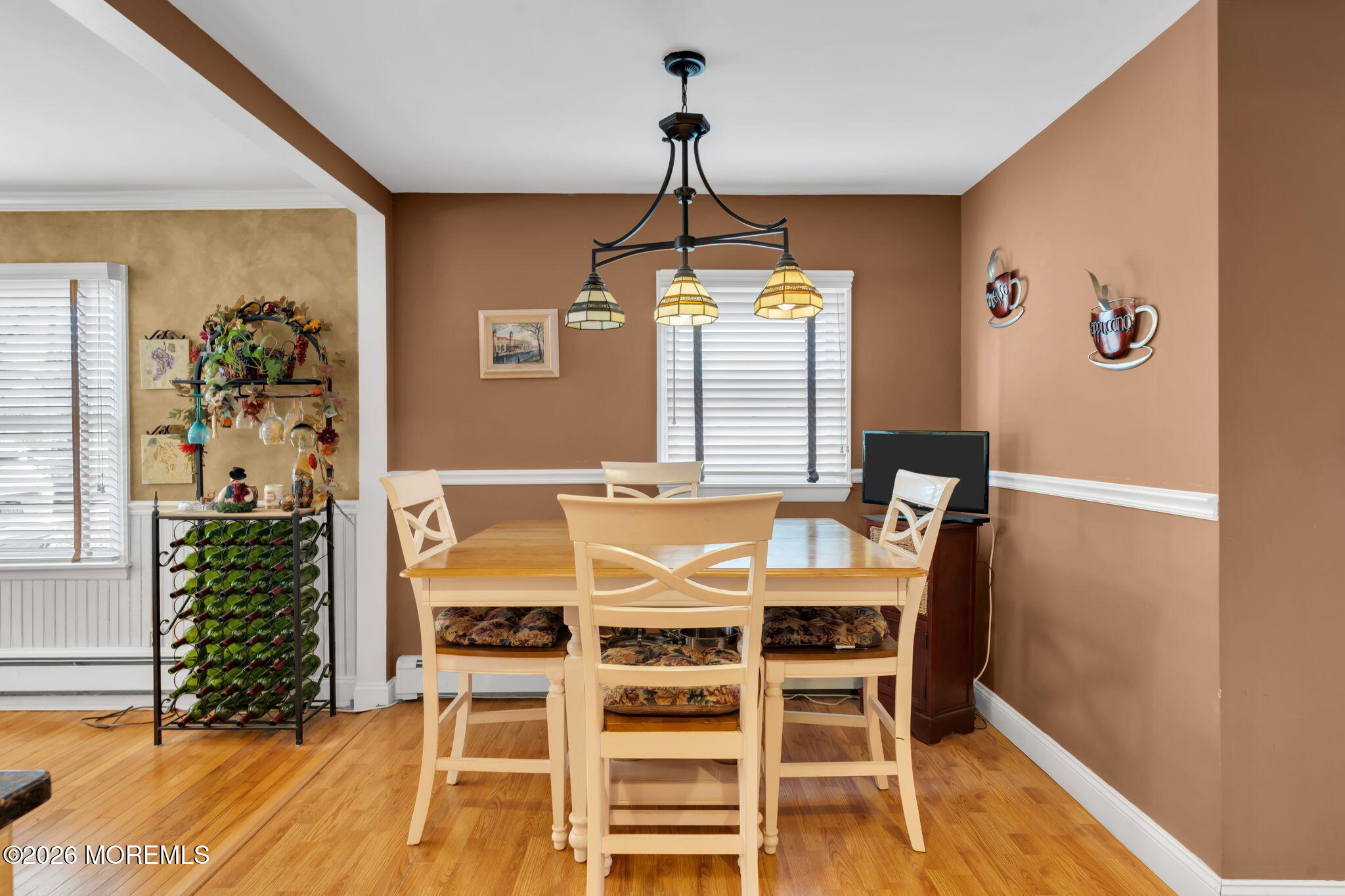 83 Seawood Drive Keyport, NJ 07735 - Photo 4 of 23 a view of a dining room with furniture window and wooden floor