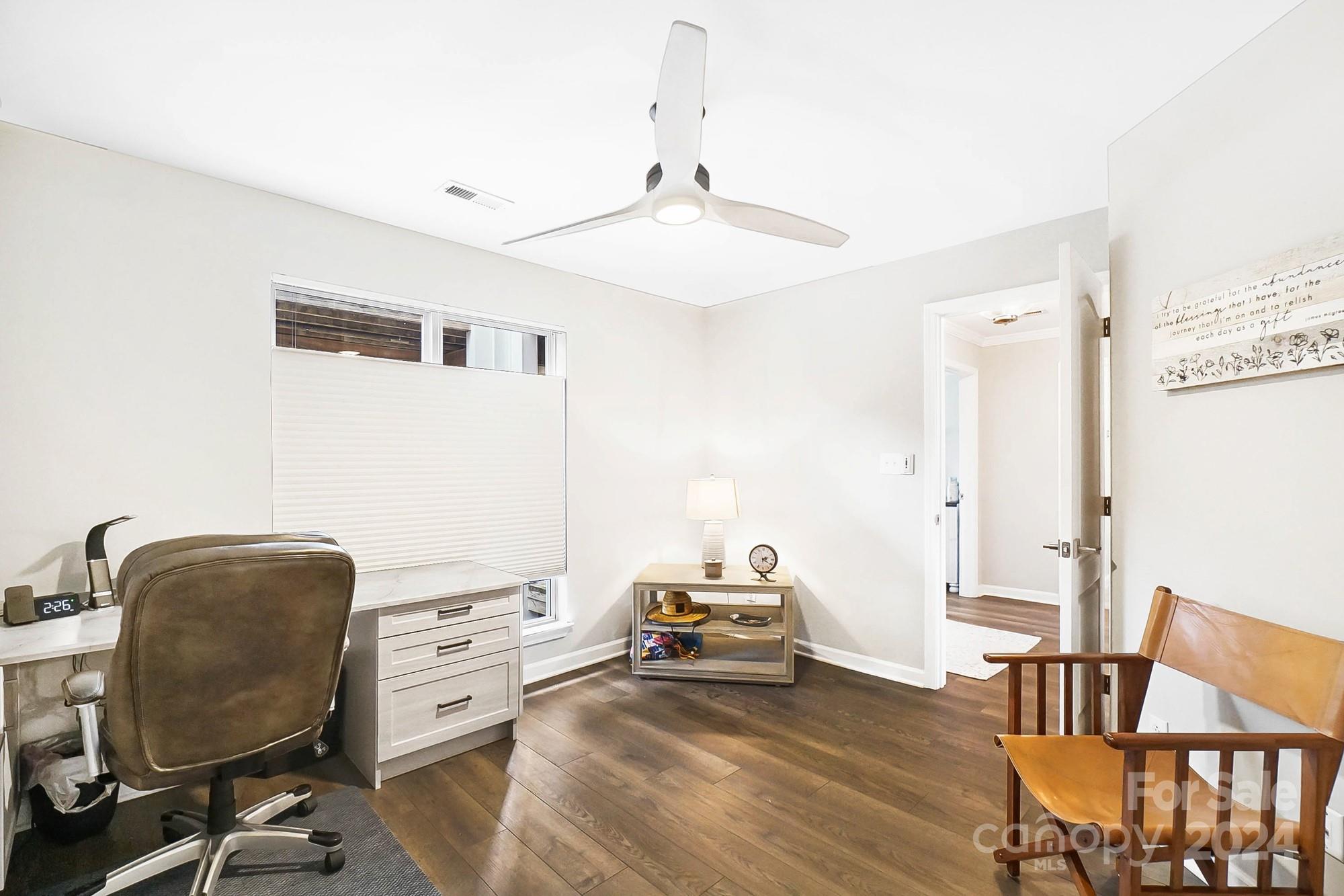 18621 Harborside Drive Cornelius, NC 28031 - Photo 18 of 33 a view of a workspace with furniture and a livingroom