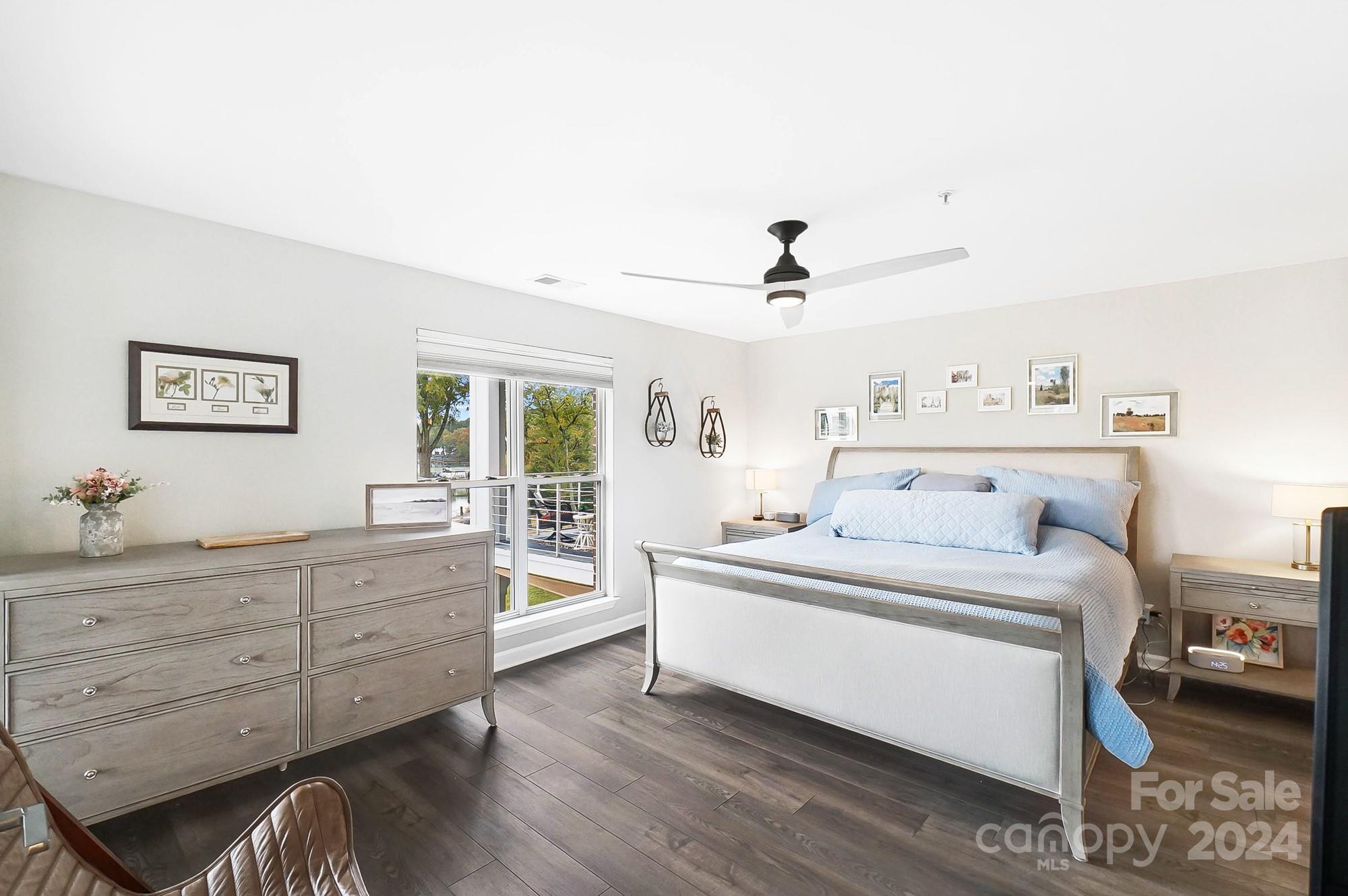 18621 Harborside Drive Cornelius, NC 28031 - Photo 20 of 33 a room with a bed and a dresser