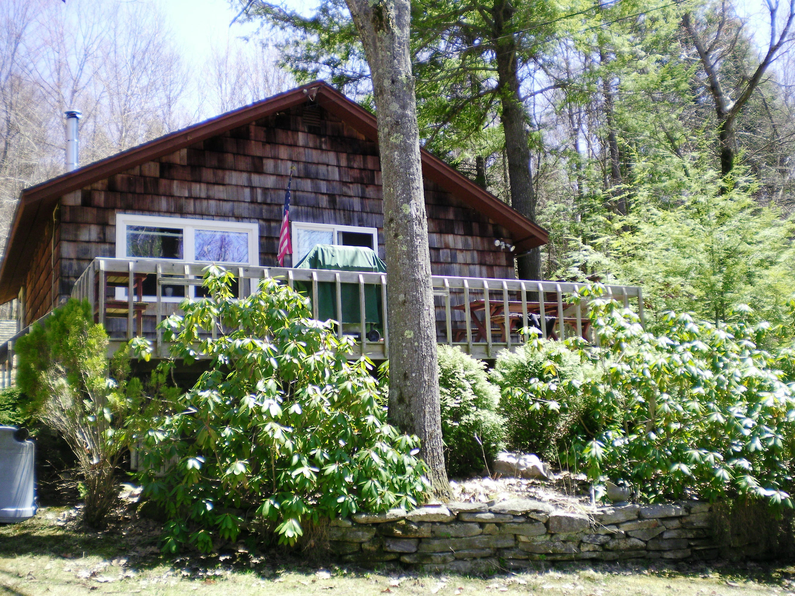 27 Lake View Road Peru, MA 01235 - Photo 4 of 26 a front view of a house with a yard