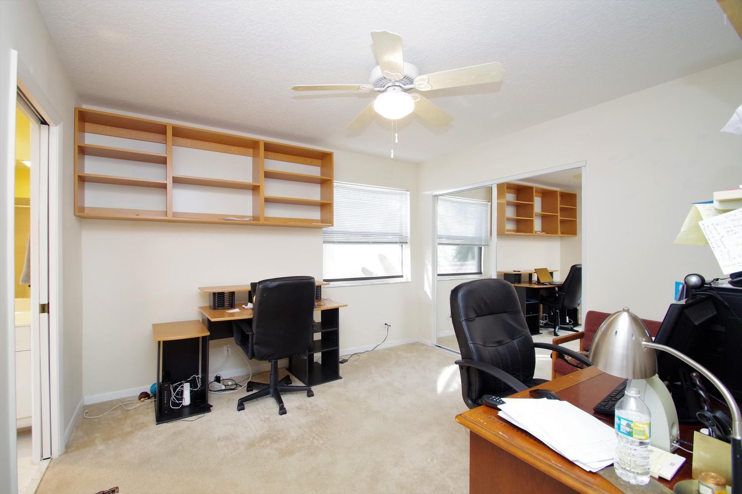 6535 Colomera Drive Boca Raton, FL 33433 - Photo 25 of 36 a view of a workspace with furniture and a window
