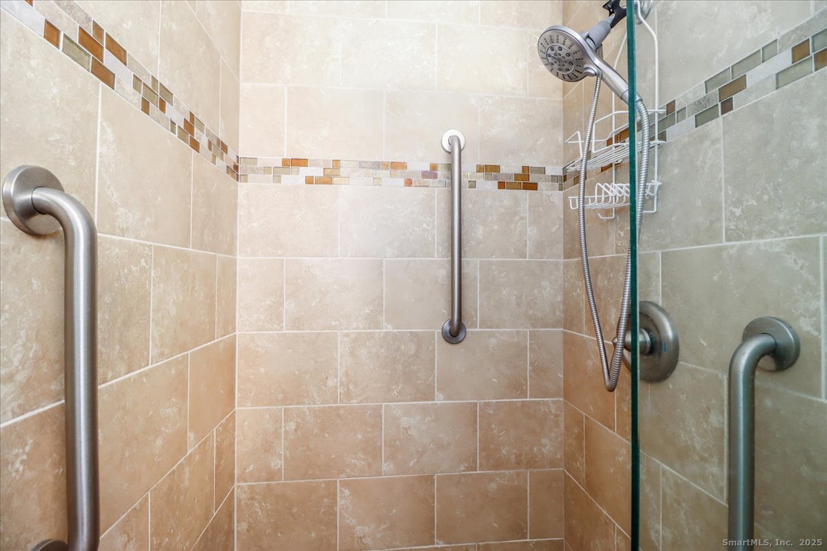 25 St George Place Newtown, CT 06482 - Photo 13 of 35 a bathroom with a shower