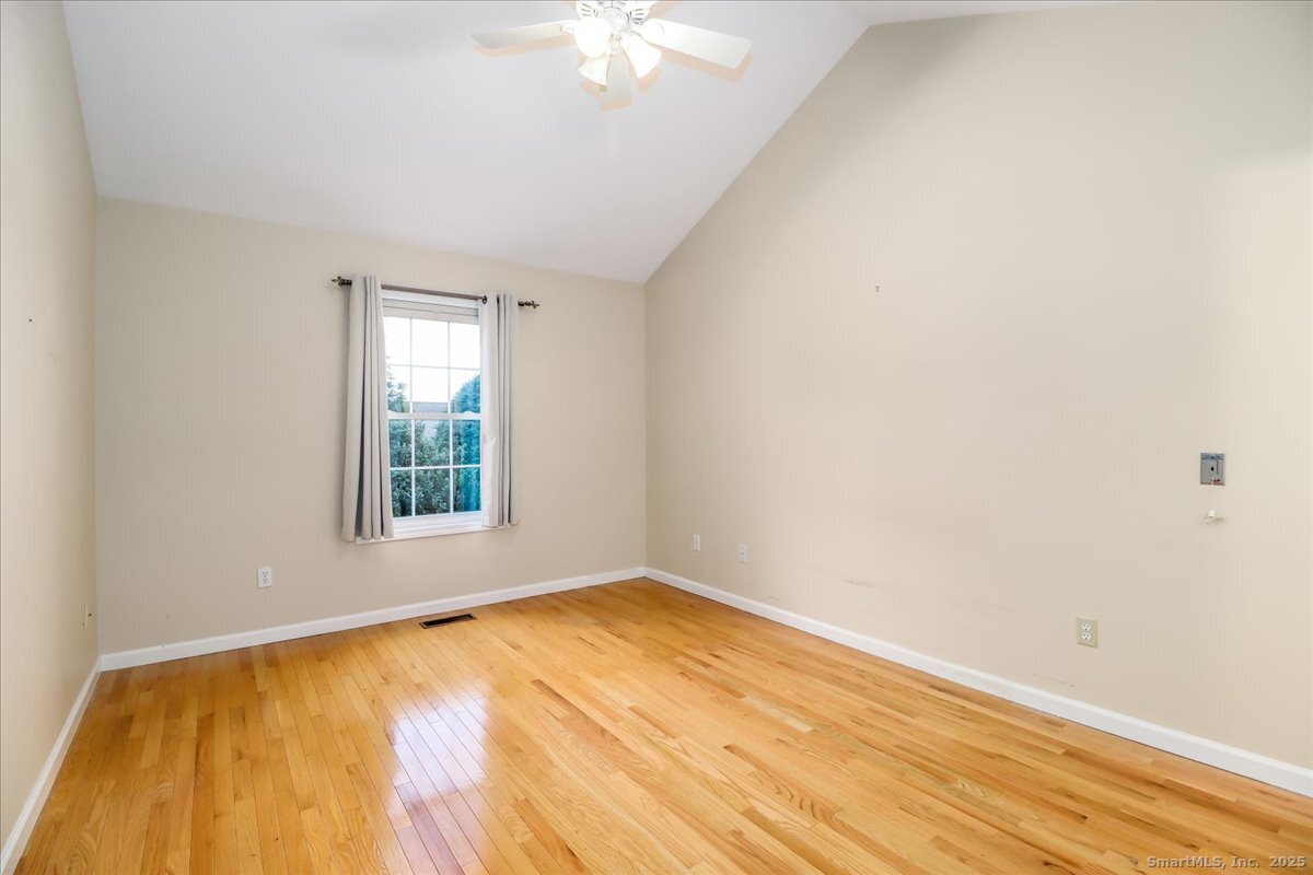 25 St George Place Newtown, CT 06482 - Photo 17 of 35 an empty room with a window