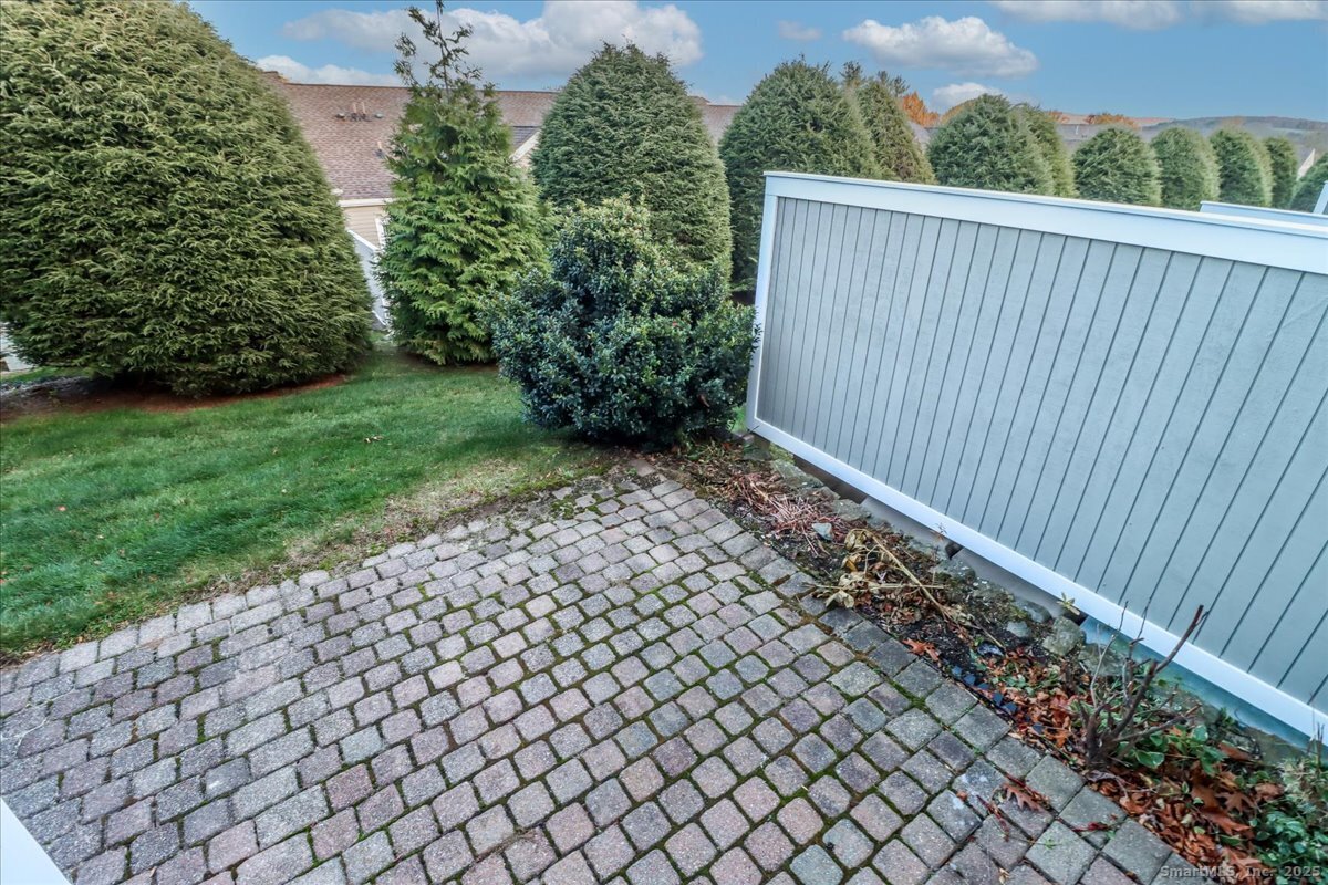 25 St George Place Newtown, CT 06482 - Photo 23 of 35 a view of a backyard