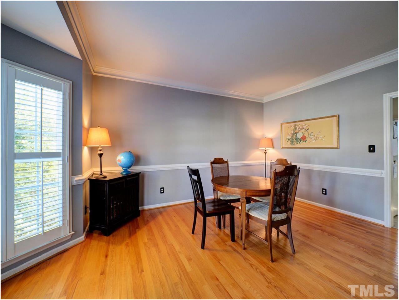2312 Clerestory Place Raleigh, NC 27615 - Photo 12 of 25 a view of a workspace with furniture and a window