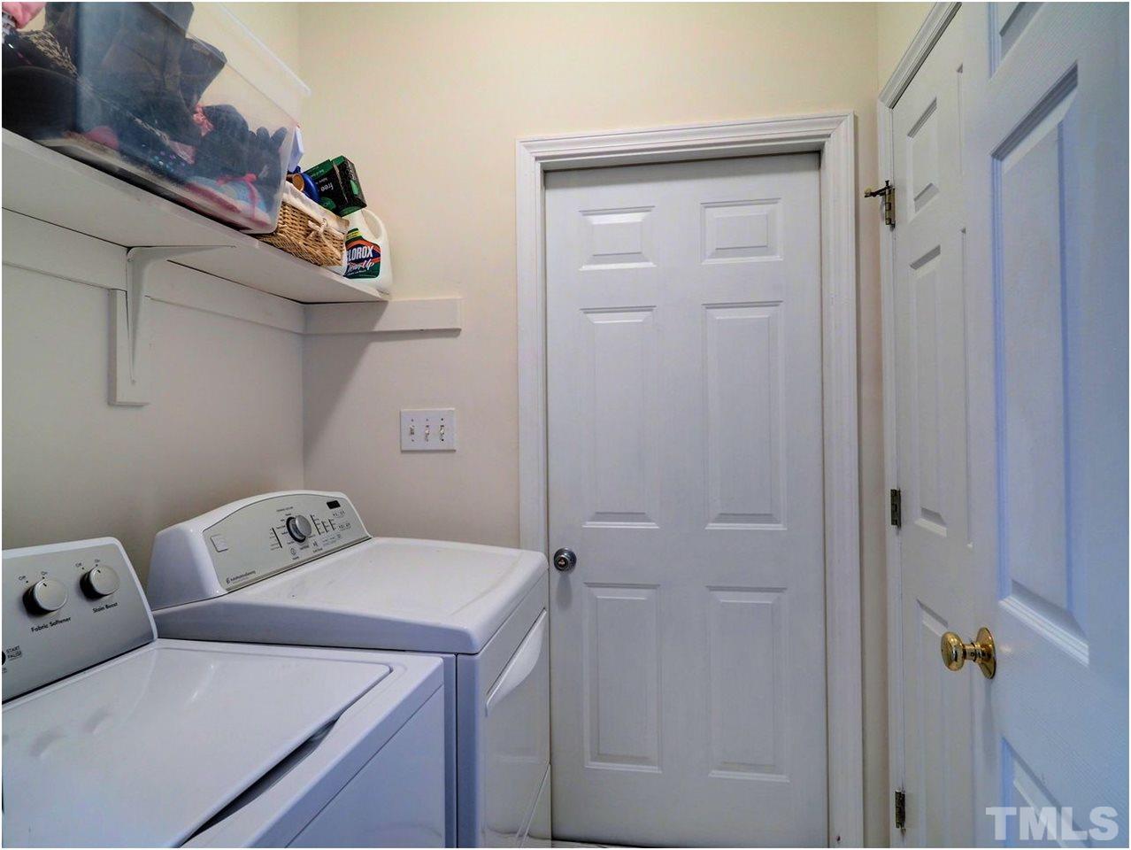 2312 Clerestory Place Raleigh, NC 27615 - Photo 14 of 25 a utility room with dryer and washer