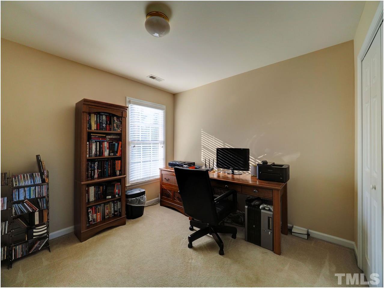 2312 Clerestory Place Raleigh, NC 27615 - Photo 15 of 25 a view of a workspace with furniture