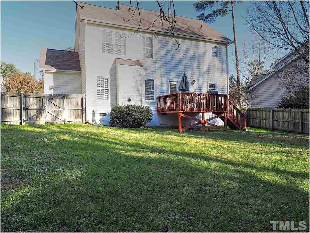 2312 Clerestory Place Raleigh, NC 27615 - Photo 25 of 25 a view of a house with a backyard