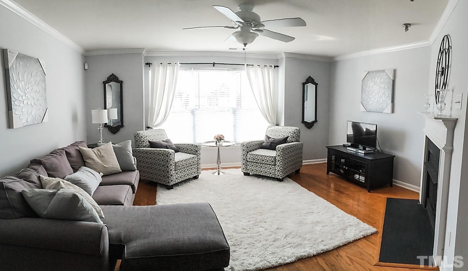 9906 Marni Court Raleigh, NC 27617 - Photo 2 of 11 a living room with furniture
