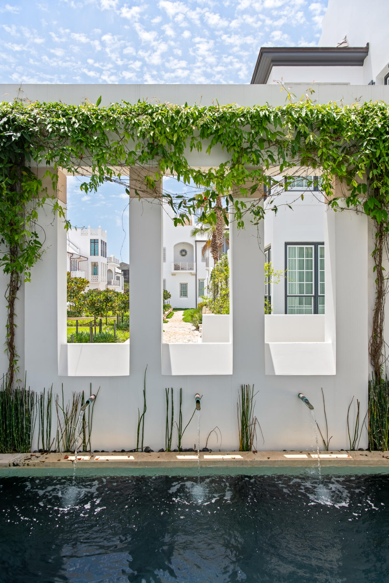25 Moongate Court Inlet Beach, FL 32461 - Photo 11 of 53 a front view of a house with a yard