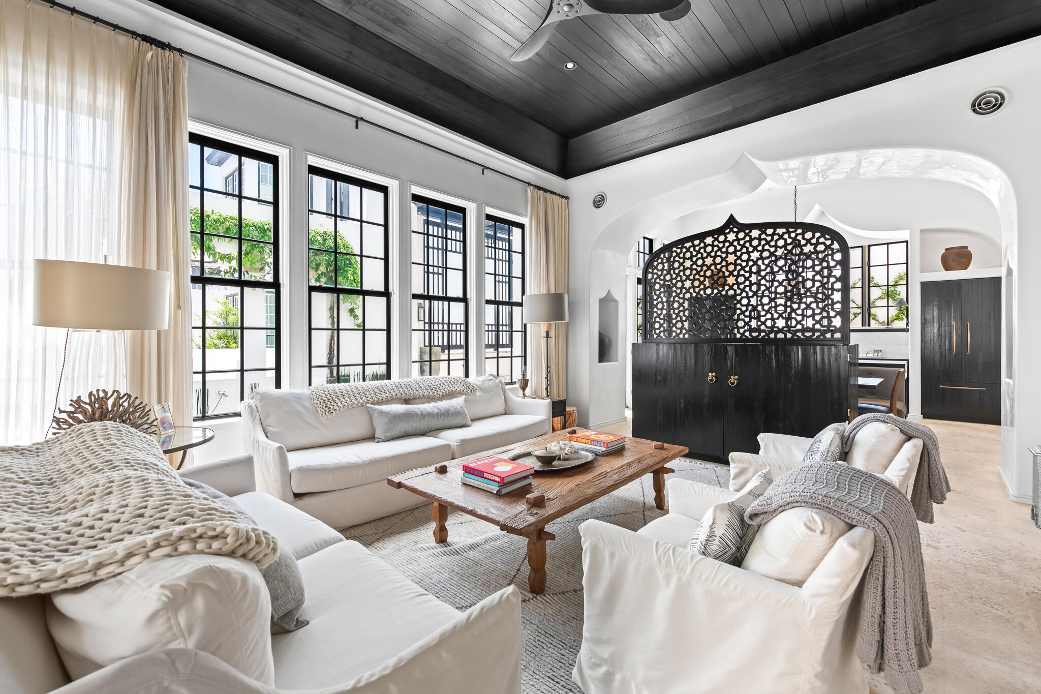25 Moongate Court Inlet Beach, FL 32461 - Photo 19 of 53 a living room with furniture and a floor to ceiling window