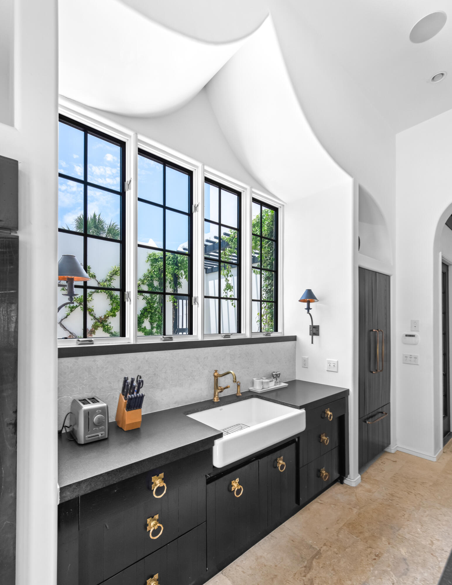 25 Moongate Court Inlet Beach, FL 32461 - Photo 24 of 53 a kitchen with sink a window and cabinets