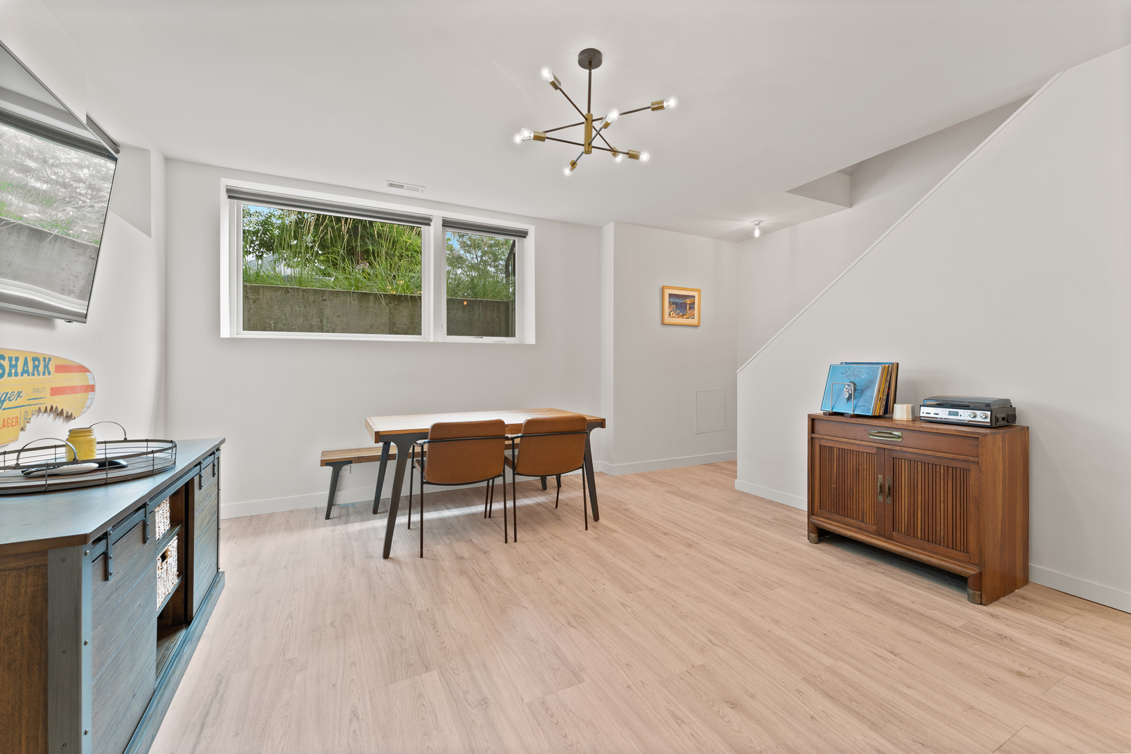 3650 North Kenneth Avenue Chicago, IL 60641 - Photo 28 of 39 a work room with furniture and a wooden floor